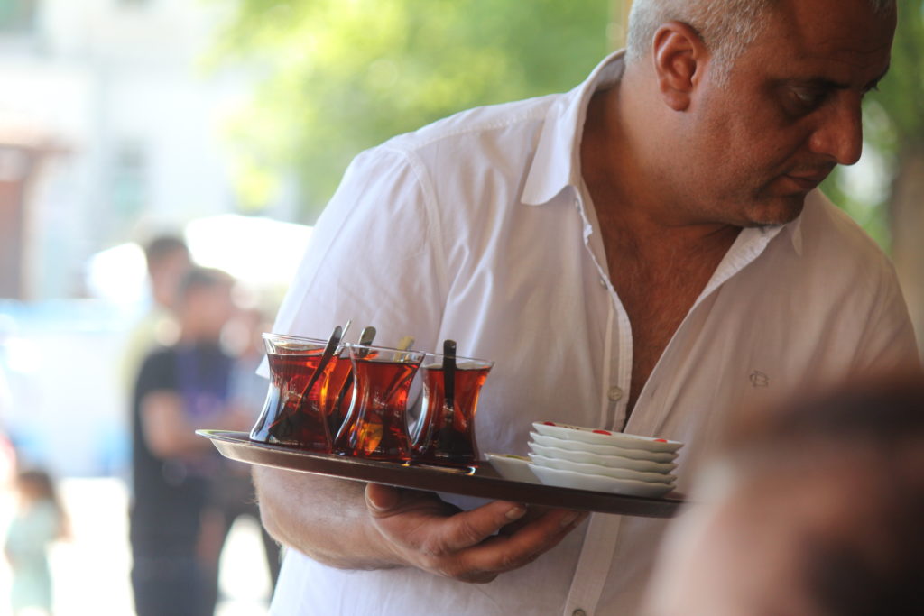 Man serving tea